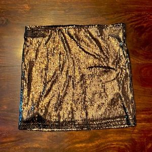 Sequence stretch mini skirt. Copper with black undertone. Great for going out!